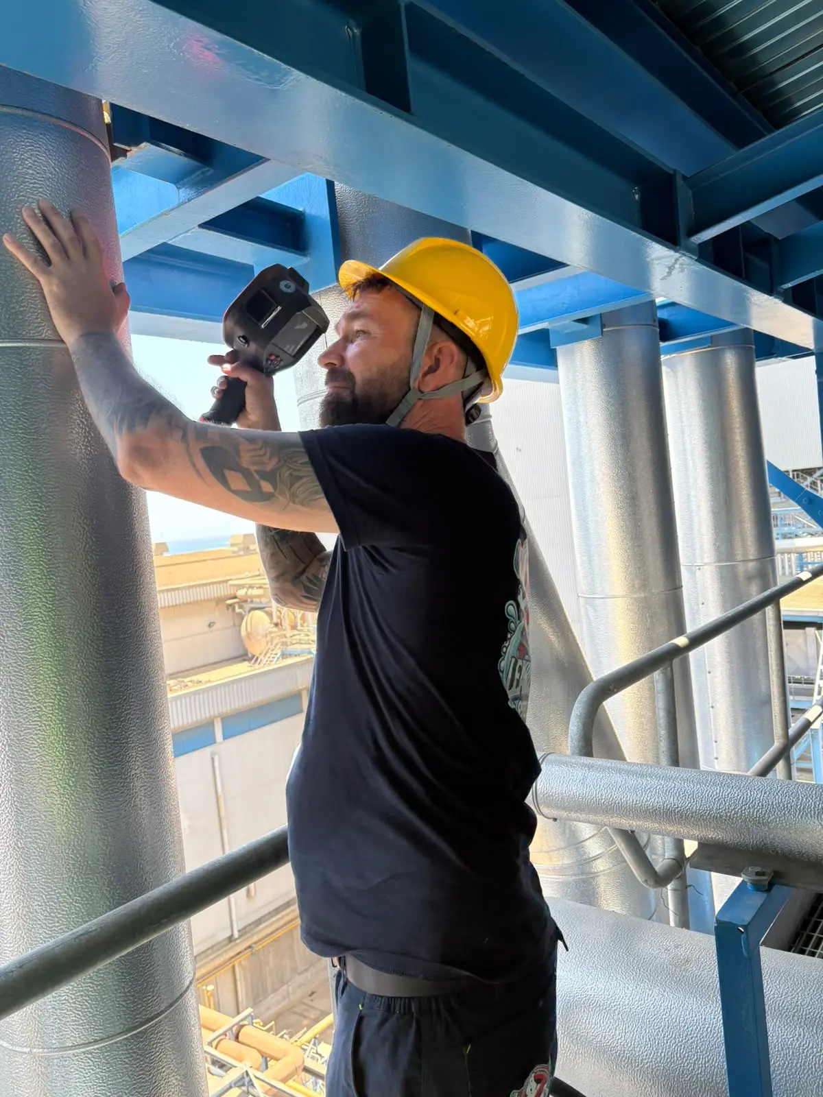 LeakBusters specialist using professional detection equipment on industrial pipework in Cyprus